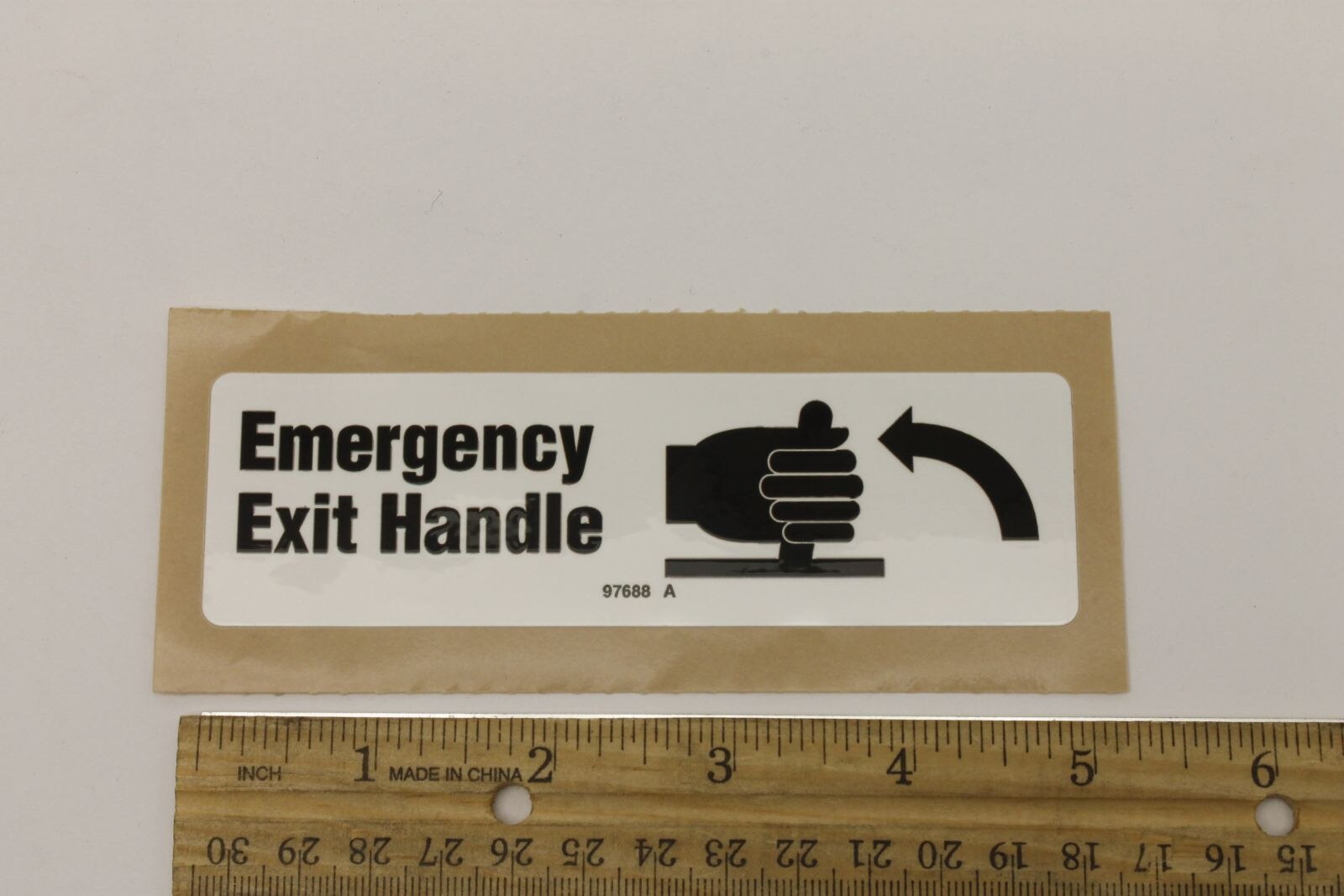Genie Part # 97688GT – Decal, Emergency Exit Handle